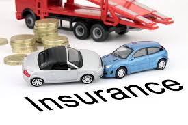 Toy cars crash into one another. Gold coins are stacked in the background, next to a red tow truck. The word "insurance" is printed below the cars. Car Insurance